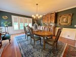 Formal dining room has seating for everyone